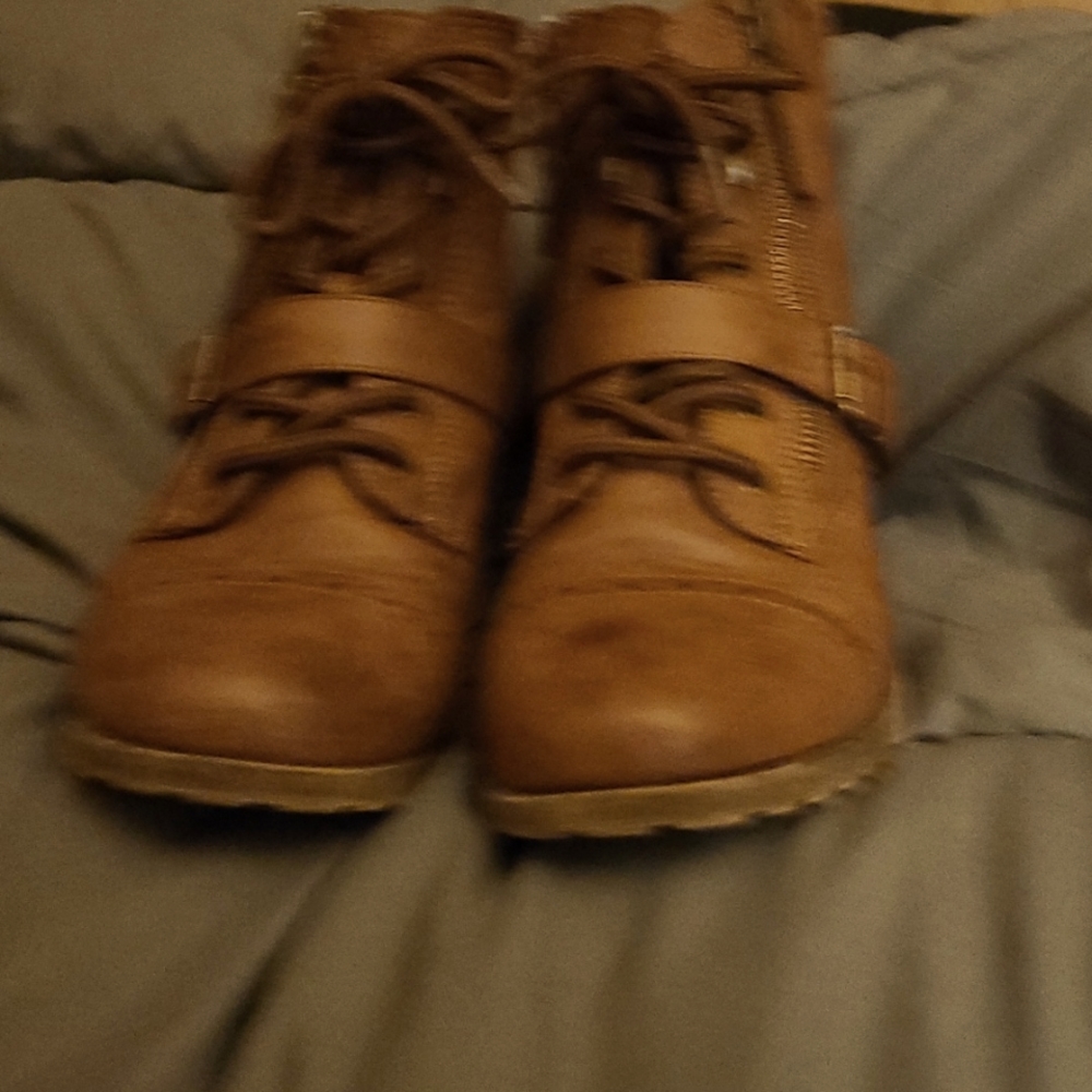 Distressed brown boots